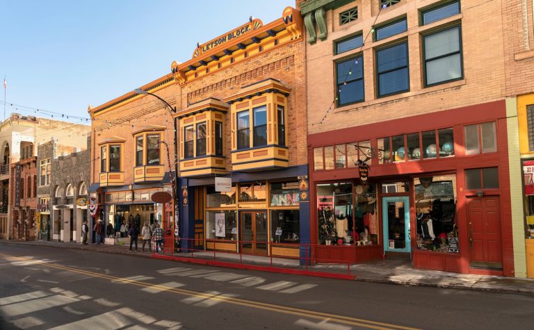 a row of buildings on a city street